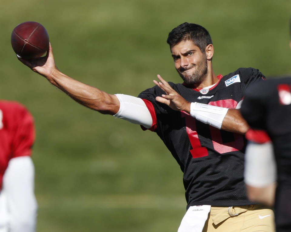 San Francisco 49ers quarterback Jimmy Garoppolo throws a pass during a combined NFL training camp with the Denver Broncos Saturday, Aug. 17, 2019, at the Broncos' headquarters in Englewood, Colo. (AP Photo/David Zalubowski)