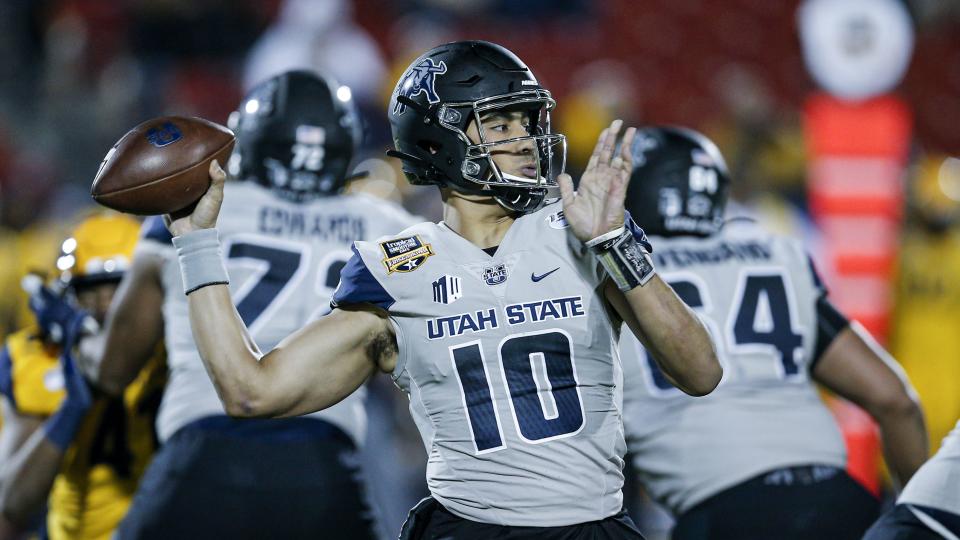 Utah State quarterback Jordan Love looks to pass during game against Kent State Friday, Dec. 20, 2019, in Frisco, Texas. As a sophomore at Utah State, Love led the Aggies to an 11-2 record while breaking numerous school records. | Brandon Wade, Associated Press