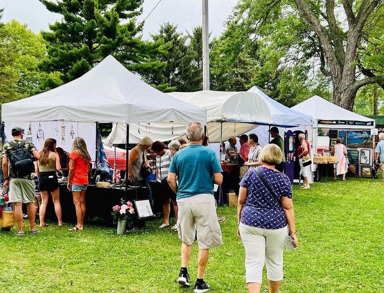 Attendees enjoy more than 90 artists, live music, activities and food while attending the 2023 Chesterton Art Fair. This year's event is Aug. 3 and 4, 2024.