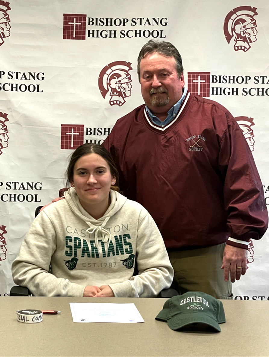 Mikayla Brightman with Bishop Stang coach Bill Theodore