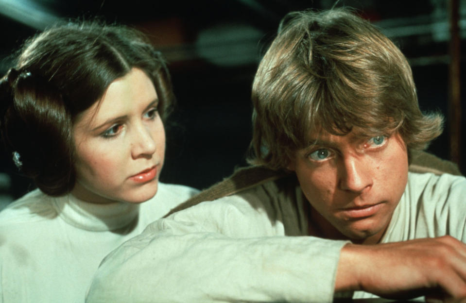 "Star Wars Trilogy" (1977,1980, and 1983) Carrie Fisher (Princess Leia) and Mark Hamill (Luke Skywalker) (Photo Credit: 20th Century Fox_LucasFilm LTD/Shooting Star) *** Please Use Credit from Credit Field *** HANDOUT / EDITORIAL USE ONLY! Please note: Fees charged by the agency are for the agency’s services only, and do not, nor are they intended to, convey to the user any ownership of Copyright or License in the material. The agency does not claim any ownership including but not limited to Copyright or License in the attached material. By publishing this material you expressly agree to indemnify and to hold the agency and its directors, shareholders and employees harmless from any loss, claims, damages, demands, expenses (including legal fees), or any causes of action or allegation against the agency arising out of or connected in any way with publication of the material.