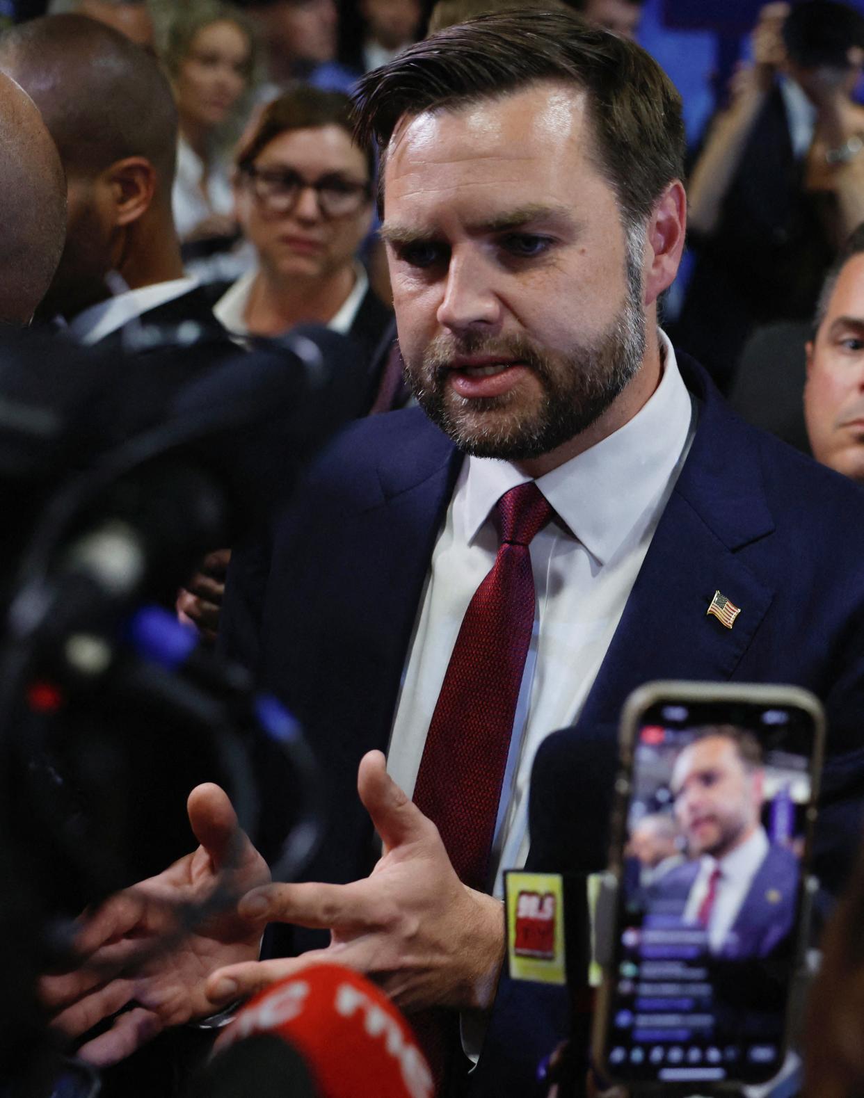 Republican vice presidential nominee J.D. Vance speaks to the media on the day of the debate between former U.S. President Donald Trump and Vice President Kamala Harris in Philadelphia, Pennsylvania on September 10, 2024.