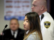 Inyoung You, 21, appears in Suffolk Superior Court, Friday, Nov. 22, 2019, in Boston. The former Boston College student pleaded not guilty to involuntary manslaughter in a case accusing her of encouraging her boyfriend Alexander Urtula to take his life. Prosecutors say she sent Urtula more than 47,000 text messages in the last two months of the relationship, including many urging him to “go kill yourself.” (David L Ryan/The Boston Globe via AP, Pool)