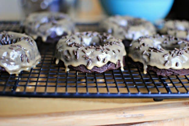 <strong>Get the <a href="http://www.simplyscratch.com/2012/06/peanut-butter-glazed-brownie-doughnuts.html">Peanut Butter Glazed Brownie Doughnuts recipe </a>from Simply Scratch</strong>