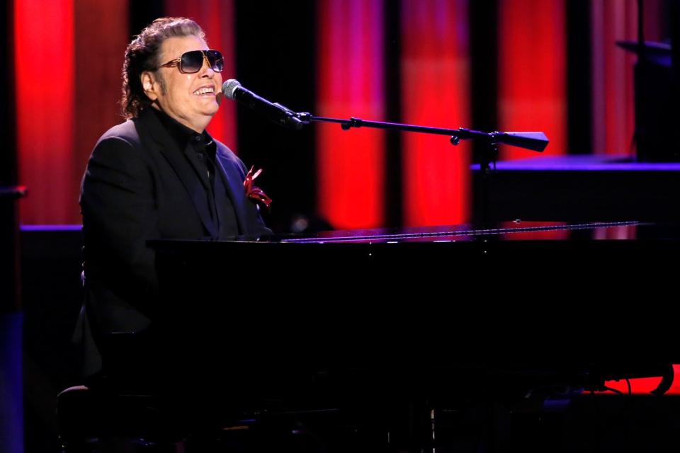 <p>Frederick Breedon IV/Getty Images for Black & White TV</p> Ronnie Milsap performs in Nashville in October 2018