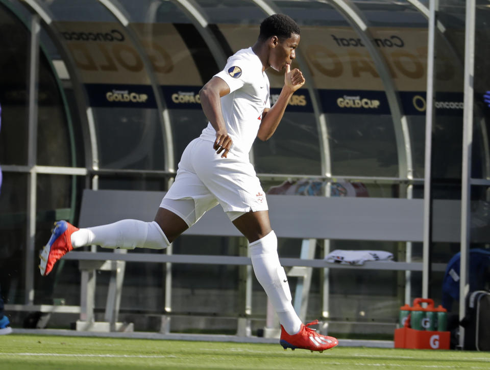 Canada's Jonathan David celebrates his goal against Cuba during the first half of their CONCACAF Golf Cup soccer match in Charlotte, N.C., Sunday, June 23, 2019. (AP Photo/Chuck Burton)