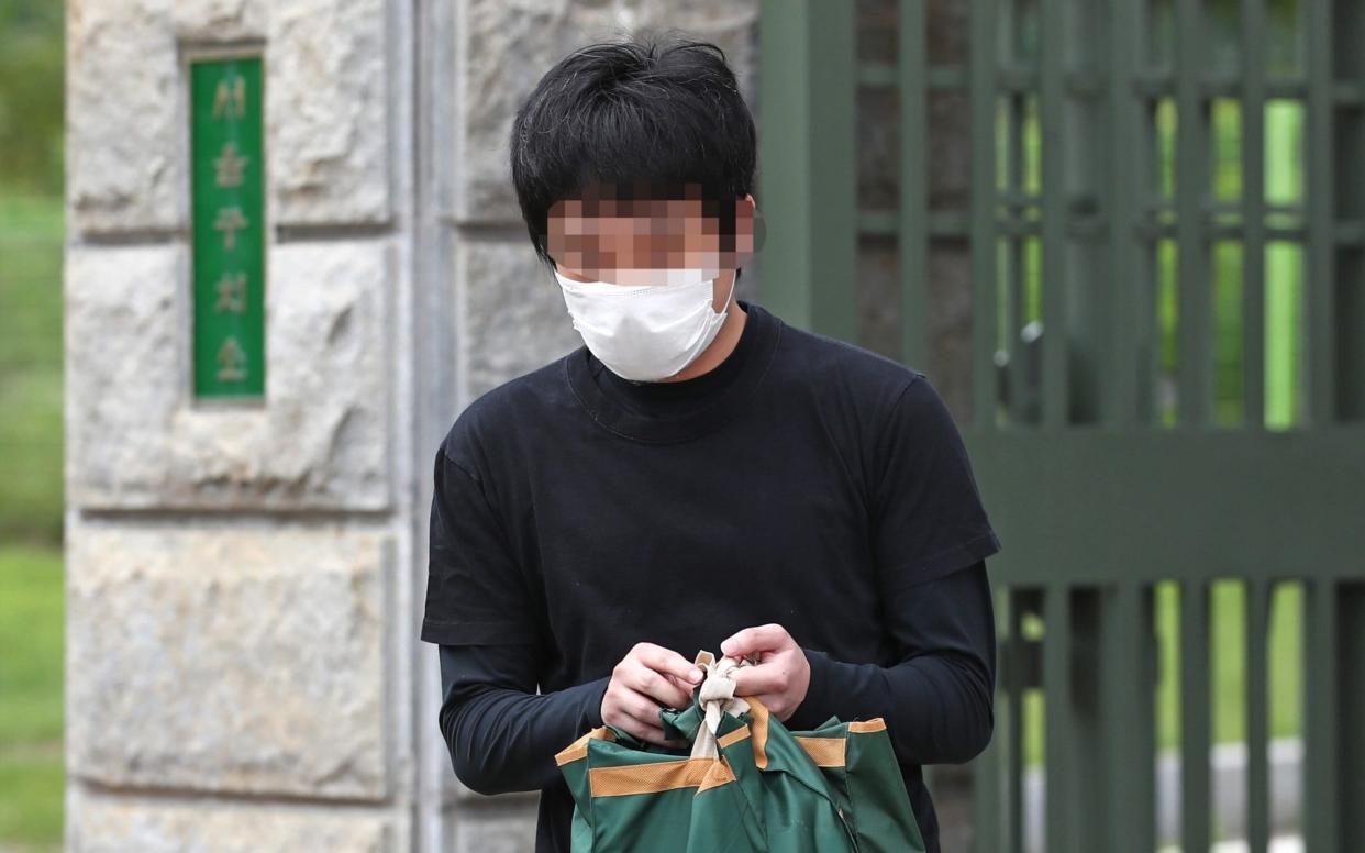 Son Jong-woo leaves a Seoul detention center after the ruling from the high court - Shutterstock