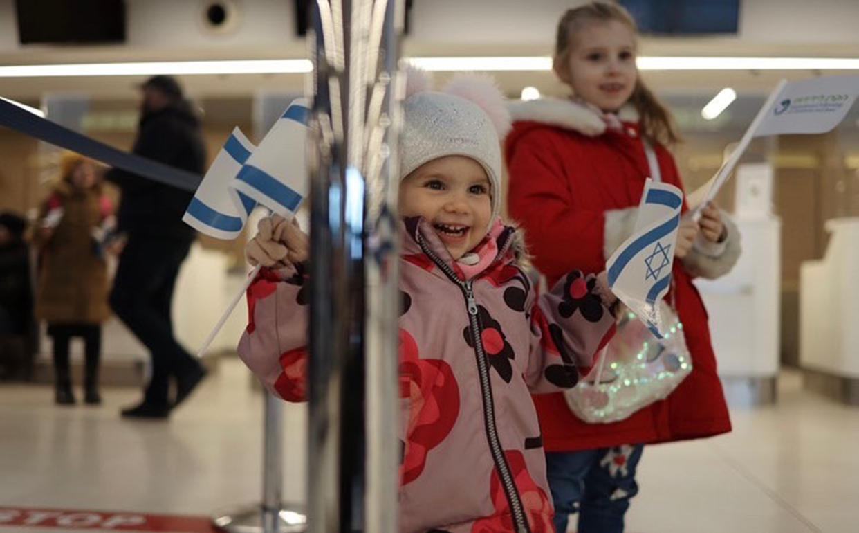 A smiling toddler, finally safe from war-torn Ukraine. (Courtesy The International Fellowship of Christians and Jews)