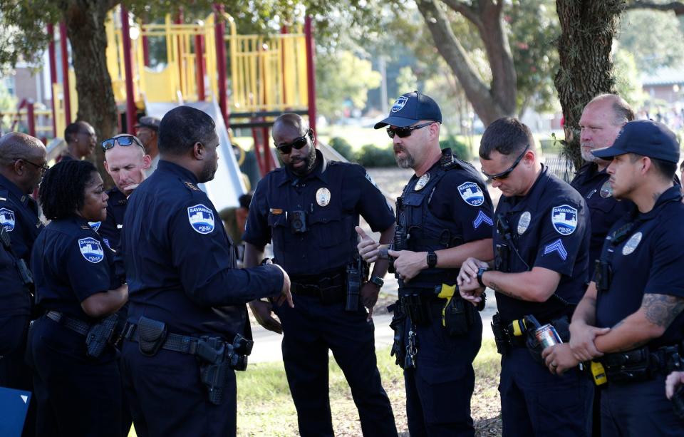 Acting Savannah Police Chief Lenny Gunther talks with officers from the Northwest Precinct before the start of Roll Call in the Streets on Tuesday September 6, 2022 at Fellwood Park.