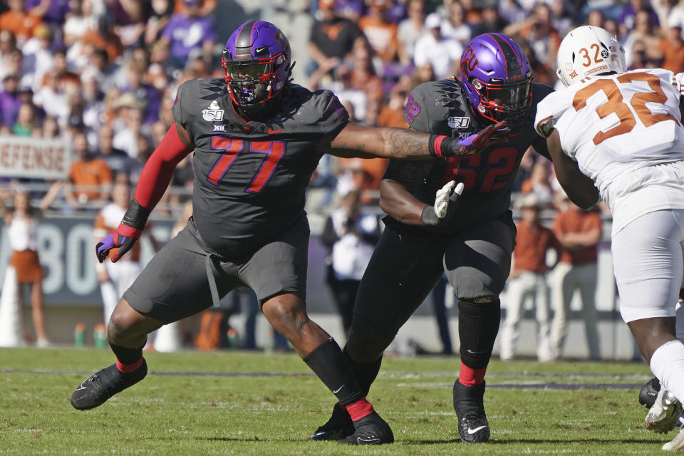 Lucas Niang blocks during a game at TCU.