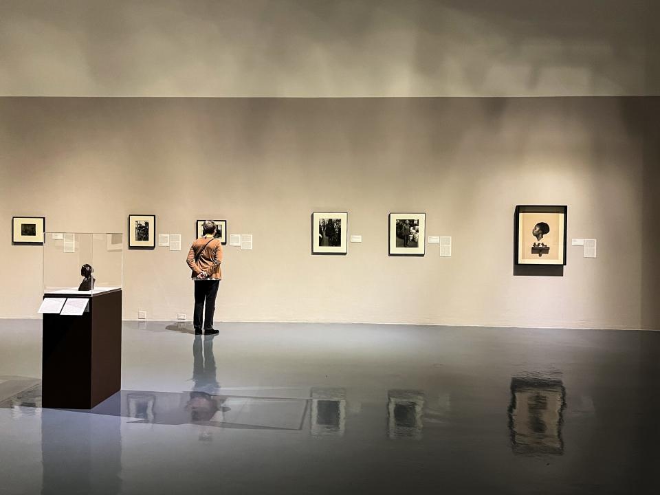 A visitor on Friday takes in the exhibit “There is a Woman in Every Color: Black Women in Art," which is on view through May 14 at the Woody and Gayle Hunt Family Gallery on the second floor of the El Paso Museum of Art at 1 Arts Festival Plaza in Downtown.