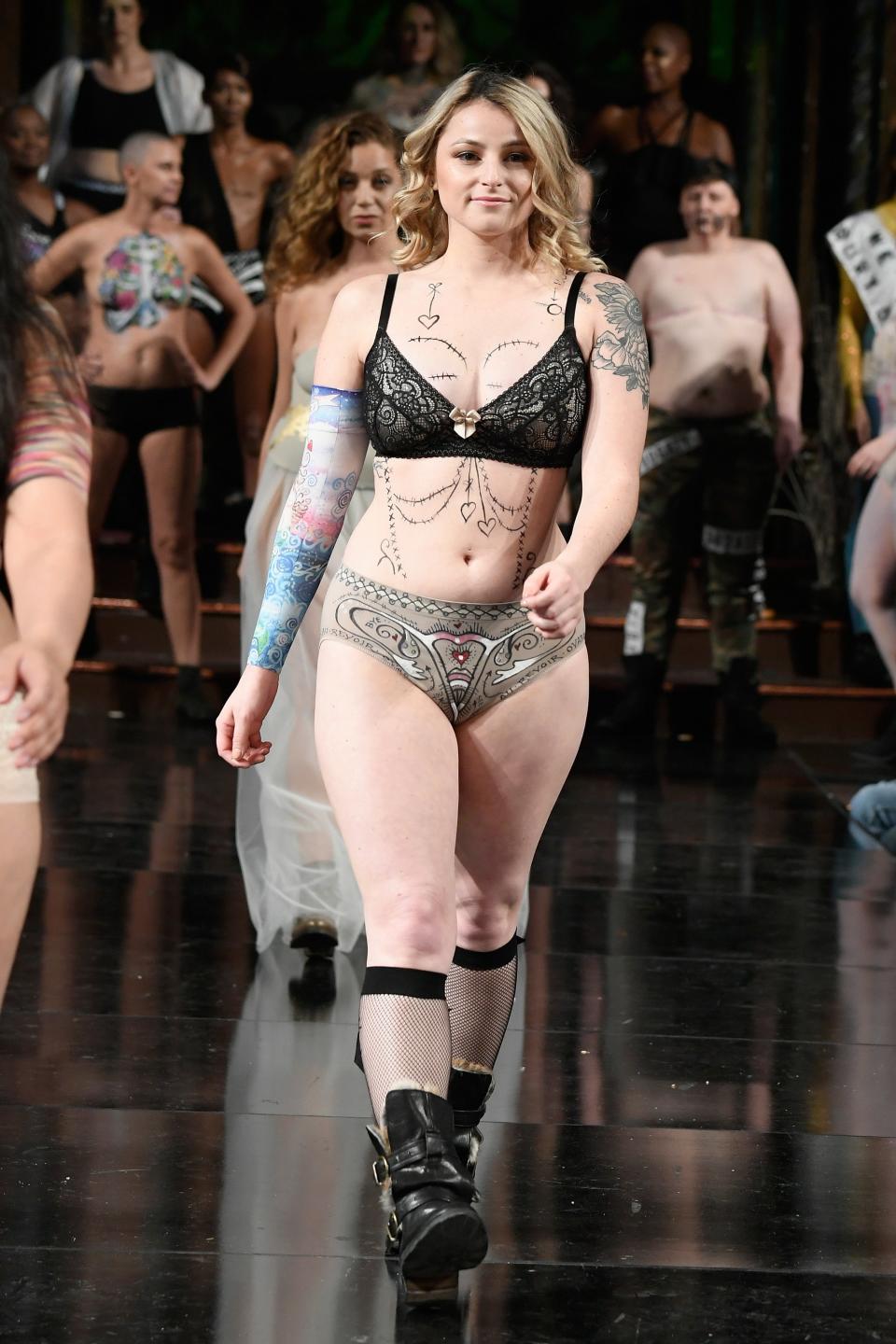 Brittney Beadle, one of the subjects of Not Just One, walks the Ana Ono Intimates runway.