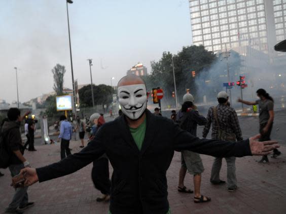 Protestors clash with riot police during a protest against the demolition of Taksim Gezi Park on 31 May 2013 (AFP/Getty)