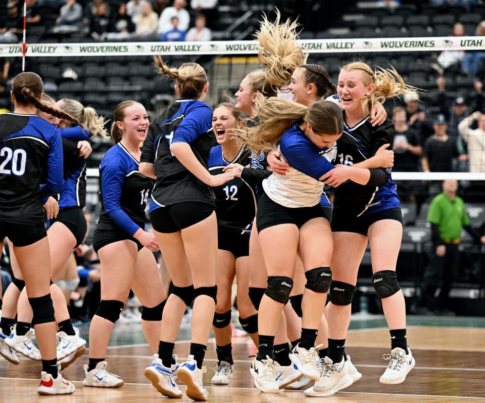 Panguitch players celebrate their win over Rich for the 1A Volleyball championship at UVU on Saturday, Oct. 28, 2023. | Scott G Winterton, Deseret News