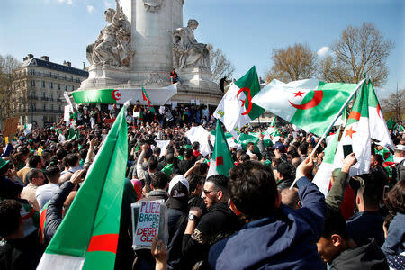 Protestors of the Algerian community of Paris attend a demonstration against President Abdelaziz Bouteflika on the Place de la Republique in Paris, France, March 31, 2019. REUTERS/Charles Platiau