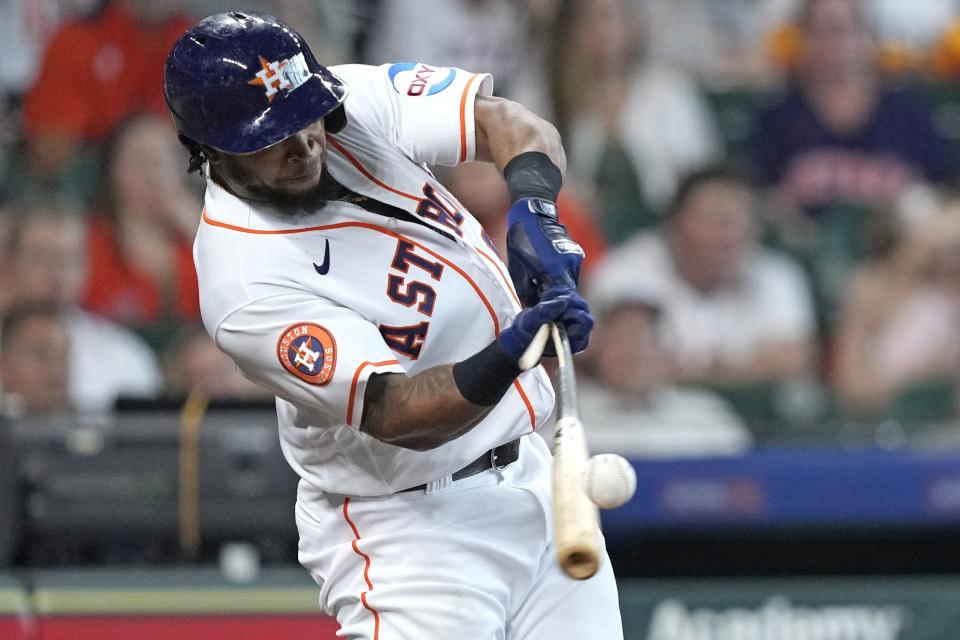 Houston Astros' Corey Julks breaks his bat while grounding out against the Oakland Athletics during the seventh inning of a baseball game Saturday, May 20, 2023, in Houston. (AP Photo/David J. Phillip)