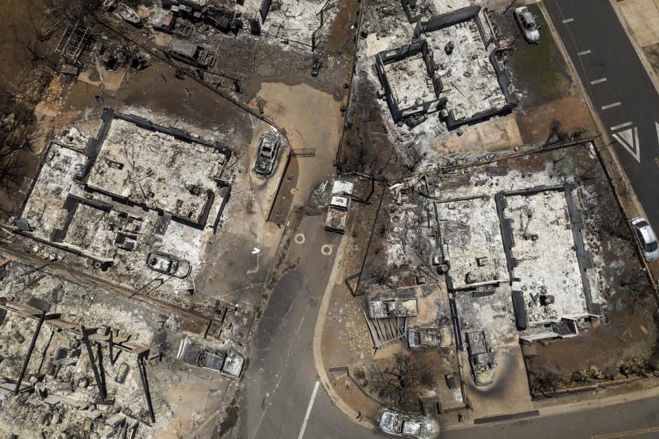 A general view shows the aftermath of a devastating wildfire in Lahaina, Hawaii, Tuesday, Aug. 22, 2023. Two weeks after the deadliest U.S. wildfire in more than a century swept through the Maui community of Lahaina, authorities say anywhere between 500 and 1,000 people remain unaccounted for. (AP Photo/Jae C. Hong)