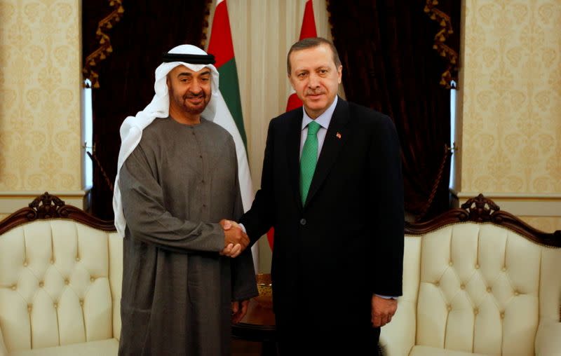 FILE PHOTO: Abu Dhabi's Crown Prince Sheikh Mohammed shakes hands with Turkey's PM Erdogan before a 2012 meeting in Ankara