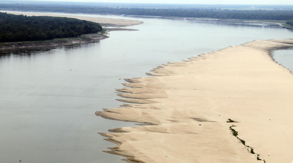 A lowering river allows the sand bars to emerge in the Mississippi River near Greenville, Miss.,Tuesday, Aug. 21, 2012. Officials with the U.S. Army Corps of Engineers say low water levels that are restricting shipping traffic, forcing harbor closures and causing towboats and barges to run aground on the Mississippi River are expected to continue into October. (AP Photo/Rogelio V. Solis)