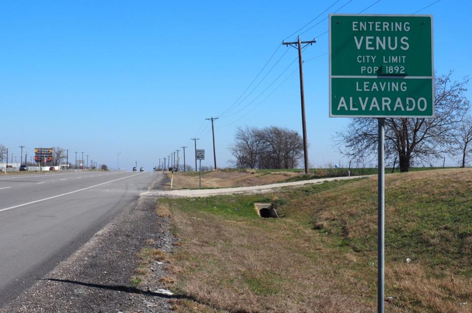 A sign marks the entrance to Venus, Texas, on the outskirts of Dallas.