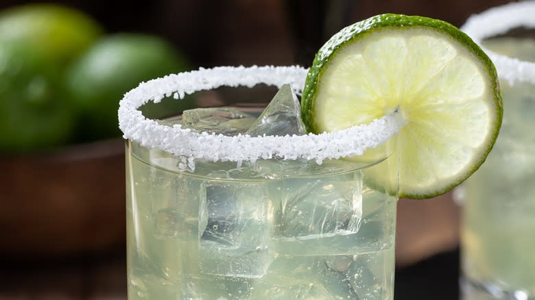 Salted rim of cocktail with lime