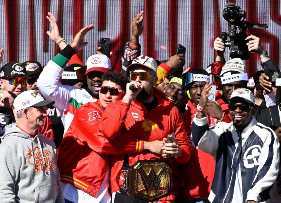 Travis Kelce (centre) celebrates with teammates during the victory parade, which was later overshadowed by a mass shooting (AFP via Getty Images)