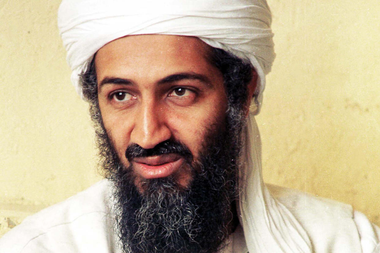 Osama bin Laden looks to the left of the camera.