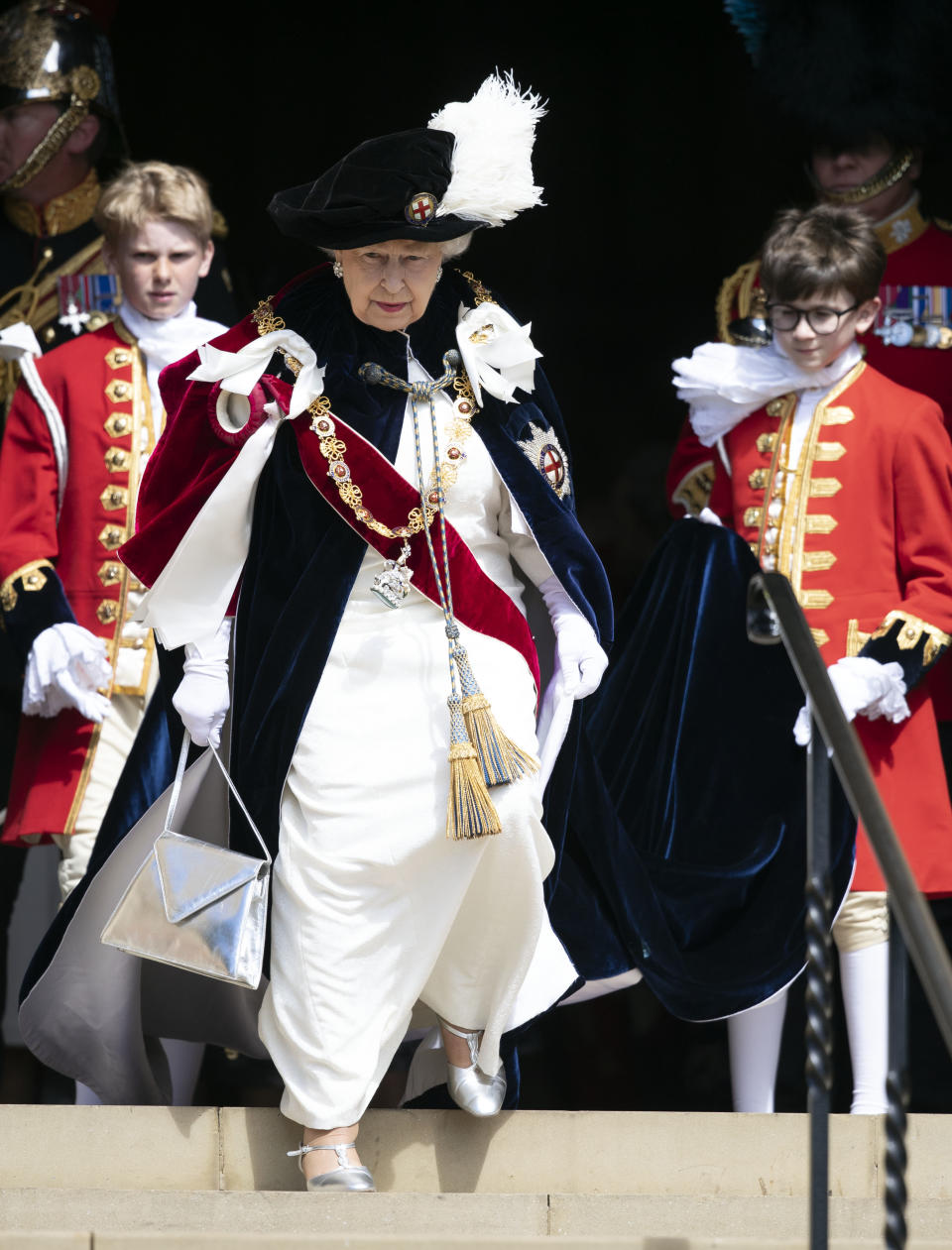 The Queen rocked some silver Mary Jane-style block heels for the service. [Photo: Getty]