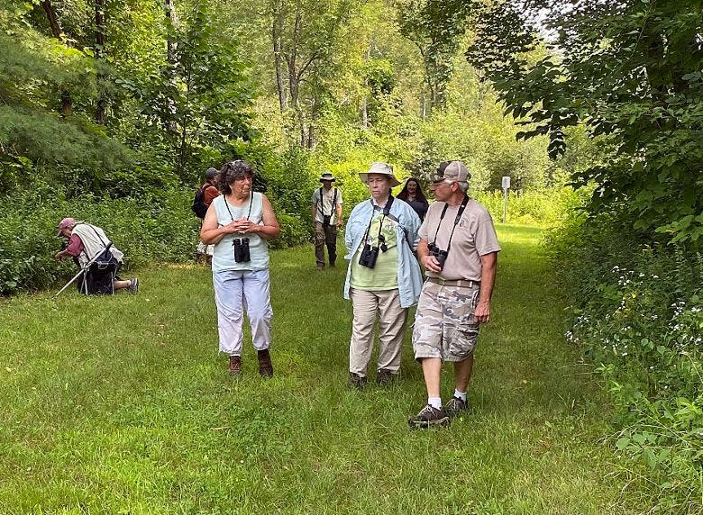 Bird & Nature Club members out in the field looking for plants, birds and insects.