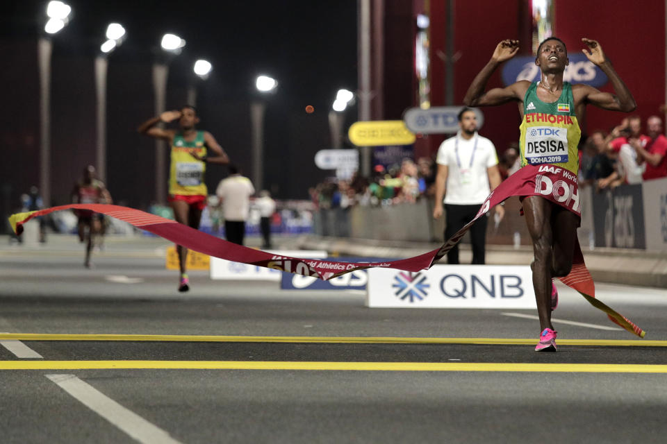Lelisa Desisa, of Ethiopia, wins the men's marathon at the World Athletics Championships in Doha, Qatar, Sunday, Oct. 6, 2019. (AP Photo/Nariman El-Mofty)