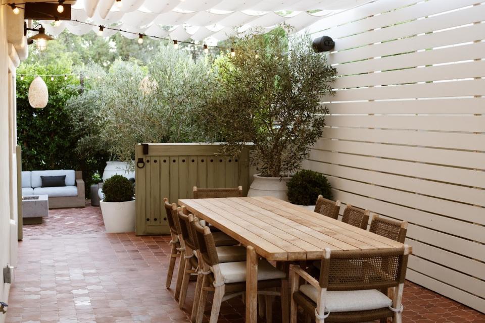 fabric shade structure in backyard by Kate Anne Designs