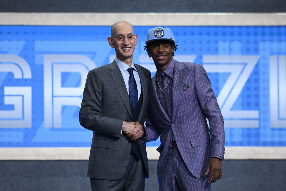 NEW YORK, NEW YORK - JUNE 20: Ja Morant poses with NBA Commissioner Adam Silver after being drafted with the second overall pick by the Memphis Grizzlies during the 2019 NBA Draft at the Barclays Center on June 20, 2019 in the Brooklyn borough of New York City. NOTE TO USER: User expressly acknowledges and agrees that, by downloading and or using this photograph, User is consenting to the terms and conditions of the Getty Images License Agreement. (Photo by Sarah Stier/Getty Images)