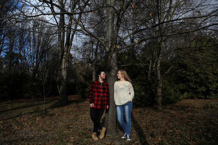 Haidar Ali Moracho, 20, and Coral Ibanez Blanco, 23, pose for a picture at the Moor's Field garden (Campo del Moro) in Madrid, Spain, February 7, 2018. Haidar, a transgender young man who's in his second year of Asian and African Studies at Madrid's Autonoma University and Coral, currently looking for a job, have been dating for seven years. "A friend of mine told me there was a girl who liked Dragon Ball's Vegeta character and wanted to become a boy. She put us in touch virtually and we spent the following year video calling each other before we were able to meet in person in Madrid," said Coral. "I wanted to kiss her so badly, but her friend's parents were with us and I refrained myself," said Haidar. "We had to wait a few more months before I was invited to his house and we kissed in his bedroom for the first time, but his family didn't approve of us at first and we spent the following five years seeing each other secretly during Japan Weekend fairs," said Coral. "It was very hard. There were times I thought it would be less painful if we broke up, but I couldn't. Together until death do us part," said Haidar. "We have gone through a lot of difficult times, but now we feel like we can face anything and anyone, no one can bring us down," said Coral. They are both Spanish history buffs and enjoy spending time together at the Moor's Field gardens beneath the Royal Palace. "This place is very meaningful to us because here we feel free," said Coral. REUTERS/Susana Vera