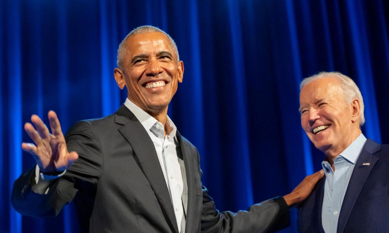 <span>Barack Obama greets Joe Biden at a fundraising event at Radio City Music Hall in New York last month.</span><span>Photograph: Alex Brandon/AP</span>