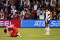 South Korea's Yeo Minji, left, and United States' Carli Lloyd, right, react at the conclusion of an international friendly soccer match in Kansas City, Kan., Thursday, Oct. 21, 2021. The match ended with no score. (AP Photo/Colin E. Braley)