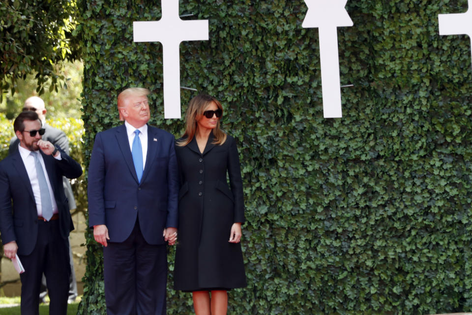 U.S. President Donald Trump and first lady Melania Trump arrive for a ceremony to mark the 75th anniversary of D-Day at the Normandy American Cemetery in Colleville-sur-Mer, Normandy, France, Thursday, June 6, 2019. World leaders are gathered Thursday in France to mark the 75th anniversary of the D-Day landings. (AP Photo/Thibault Camus)