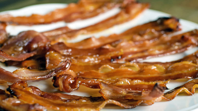 candied bacon on white plate