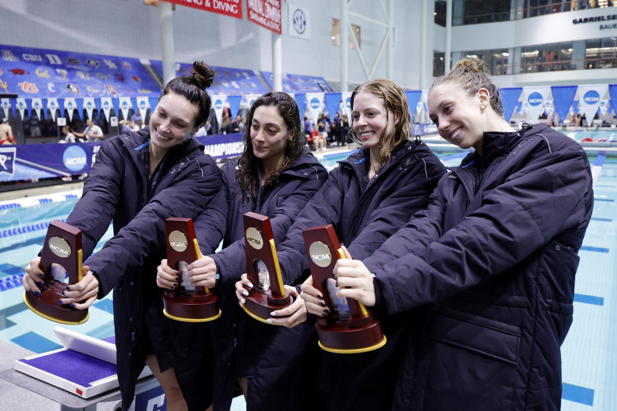 ATHENS, GEORGIA - MARCH 22: (L-R) Alex Walsh, Jasmine Nocentini, Maxine Parker and Gretchen Walsh pose with the trophy after winning the Women's 400 Yard Medley Relay finals during the Division I Women's Swimming and Diving Championships held at Ramsey Center on March 22, 2024 in Athens, Georgia. (Photo by Alex Slitz/NCAA Photos via Getty Images)