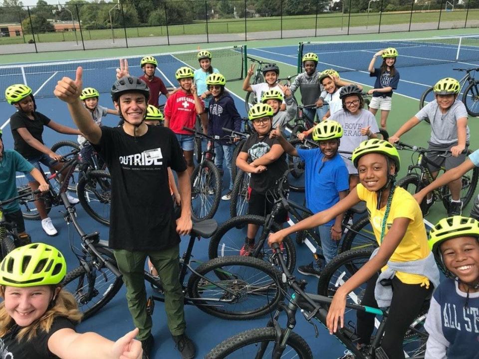 Middle school students gather in one of the nearly 300 Riding For Focus programs around the U.S. and Canada, now coming to Navarre Middle School in South Bend.