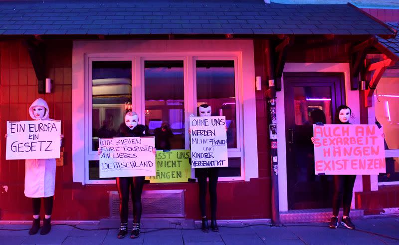 Prostitutes hold a rally in Hamburg demanding the reopening of Germany's brothels