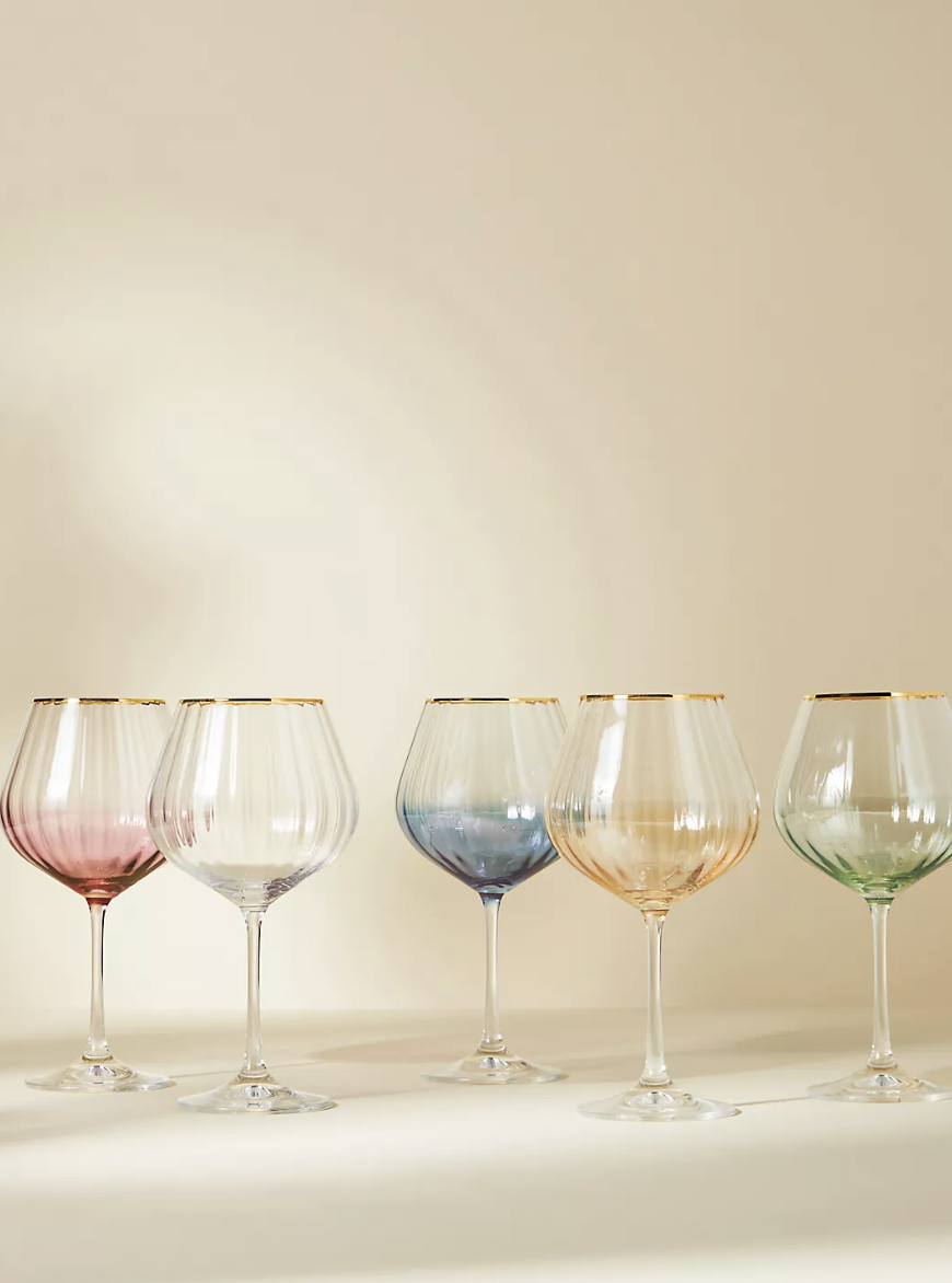 Waterfall Red Wine Glasses, Set of 4 in pink, white, blue, yellow and green (photo via Anthropologie)