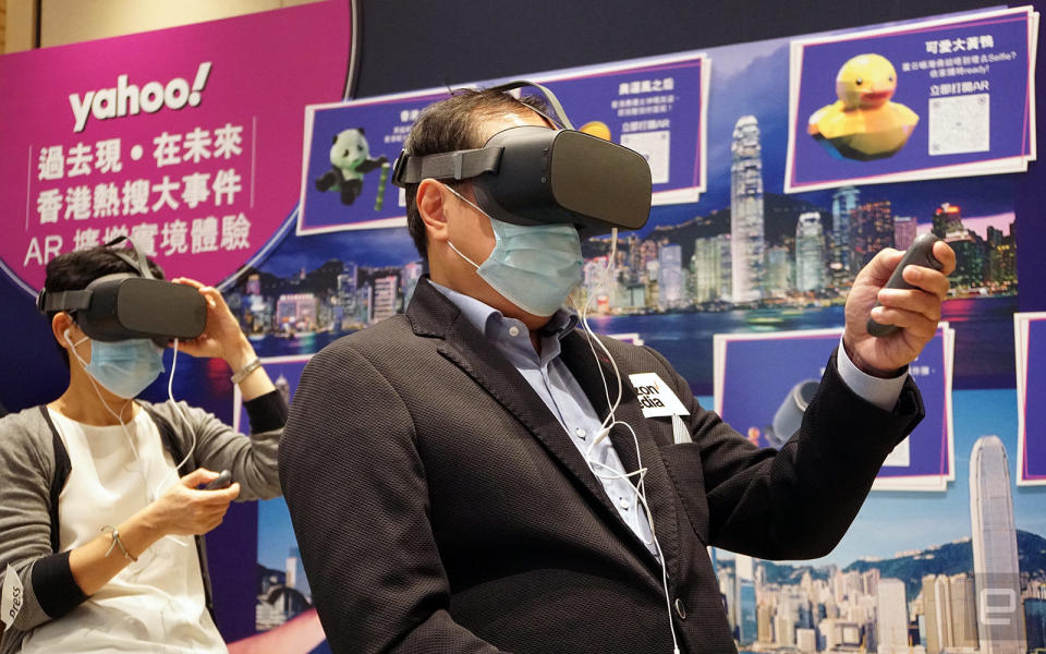 Verizon Media Co-head of APAC Rico Chan using a Pico G2 4K VR headset to visit an Engage virtual venue.