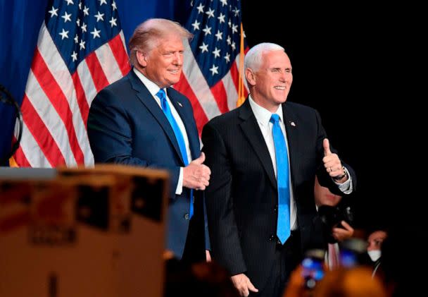 PHOTO: In this Aug. 24, 2020 file photo President Donald Trump and Vice President Mike Pence stand on a stage together at the Republican National Convention in Charlotte, N.C. (David T. Foster III/AFP via Getty Images, FILE)