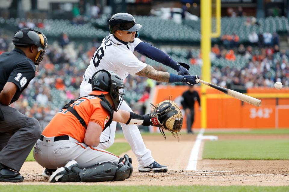 Tigers designated hitter Javier Baez hits an RBI single in the first inning against the Orioles in the first game of the doubleheader on Saturday, April 29, 2023, at Comerica Park.