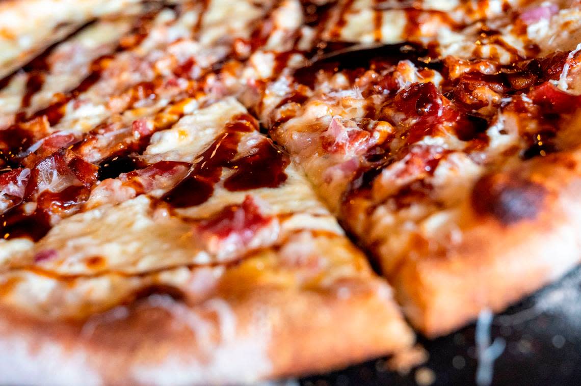 Every Wednesday at Millhouse & The Blind Pig in Tacoma’s Proctor District, a whole pizza and a bottle of house wine is just $35, dine-in or takeout.