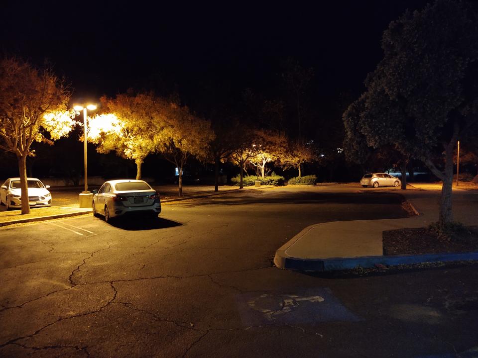 Night comes to a parking lot in Santa Barbara, one of dozens run by a non-profit that promises those living in their vehicles a safe overnight parking spot as well as a range of social services to help get them housed.