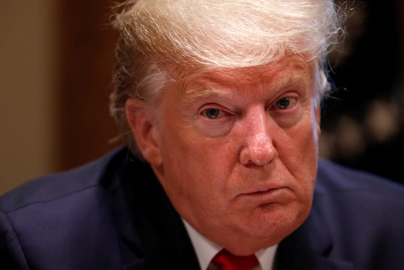 U.S. President Donald Trump participates in a listening session on youth vaping and the electronic cigarette epidemic inside the Cabinet Room at the White House in Washington