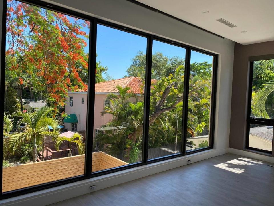 Home buyers who signed contracts and put down hundreds of thousands of dollars in deposits on townhouses along Coconut Avenue in Coconut Grove have been waiting two years or more to move into their houses. The builder, Doug Cox, keeps extending the closing date. Interior photograph of Coconut Avenue townhouse was taken in 2021.