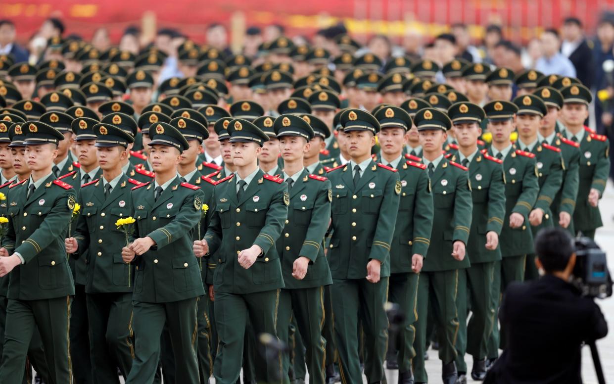 China's military might has been growing rapidly in recent years - CARLOS GARCIA RAWLINS /REUTERS