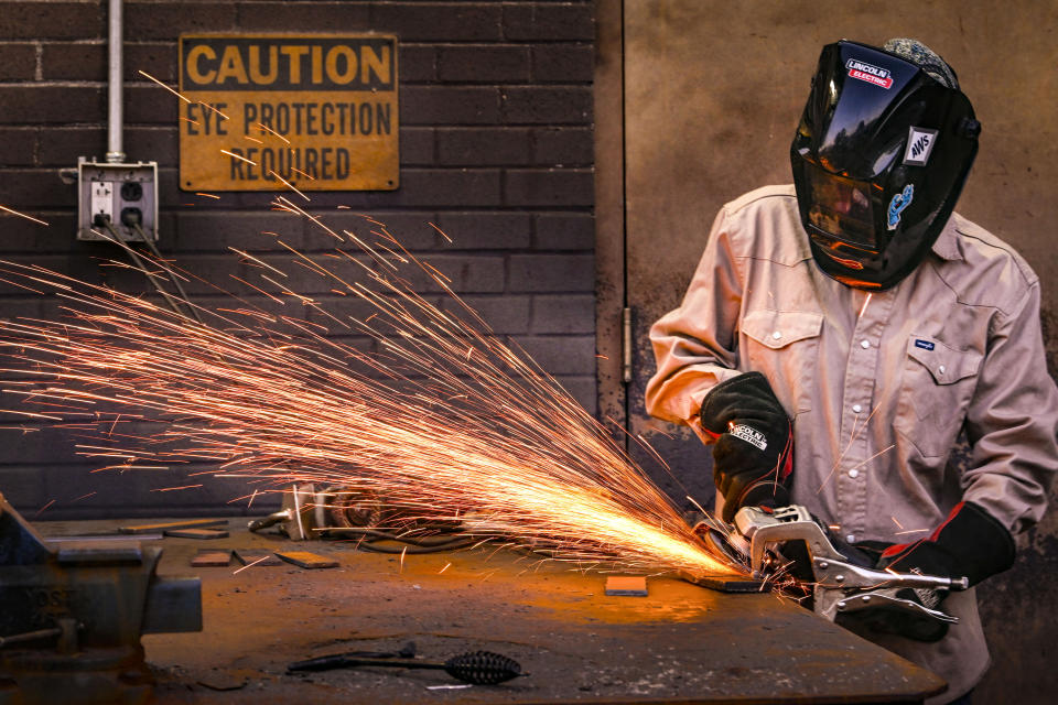 Student Abbey Carlson works during welding class at Tennessee College of Applied Technology Nashville Wednesday, April 13, 2023, in Nashville, Tenn. While almost every sector of higher education is seeing fewer students registering for classes, many trade school programs are booming with young people who are choosing trade school over a traditional four-year degree. (AP Photo/John Amis)